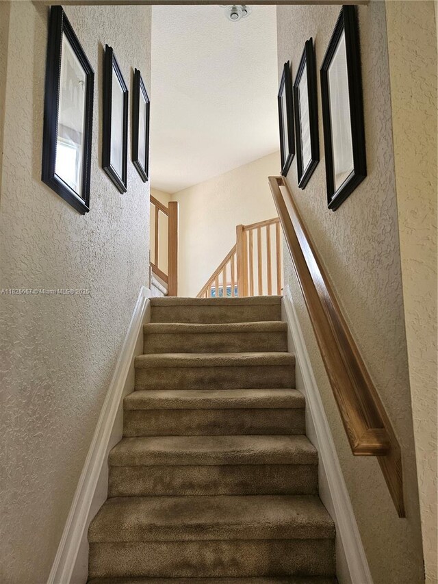 21300 Waycross Dr, Boca Raton, FL 33428 - stairway with a textured wall