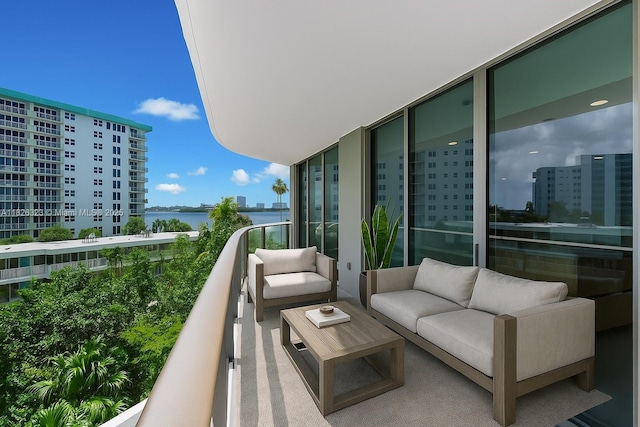 1135 103rd St Unit 408, Bay Harbor Islands, FL 33154 - balcony featuring a water view and an outdoor living space