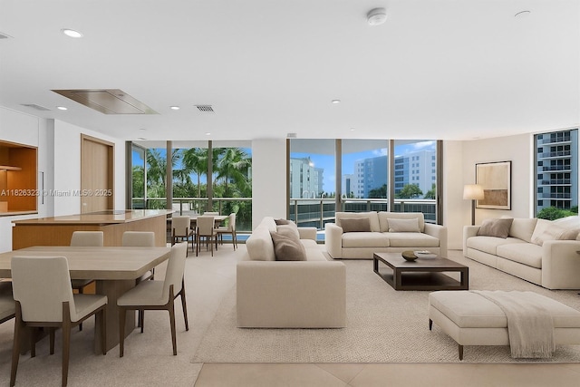 1135 103rd St Unit 408, Bay Harbor Islands, FL 33154 - living room with expansive windows, a city view, light tile patterned floors, and recessed lighting