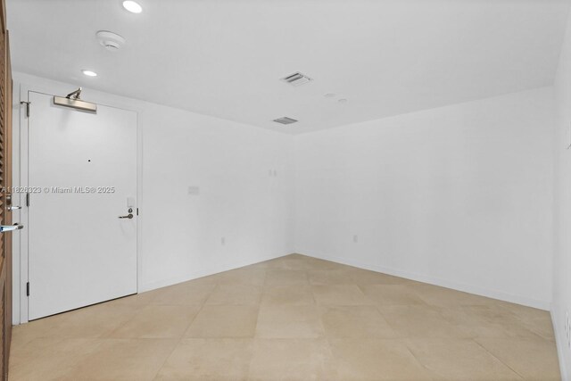 1135 103rd St Unit 408, Bay Harbor Islands, FL 33154 - spare room with recessed lighting and a smoke detector