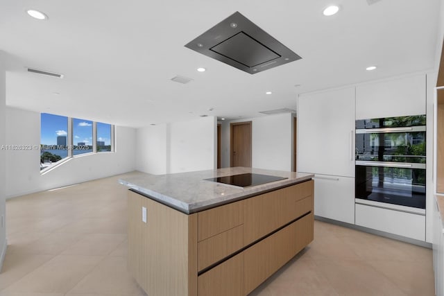 1135 103rd St Unit 408, Bay Harbor Islands, FL 33154 - kitchen featuring black appliances, a kitchen island, modern cabinets, recessed lighting, and light brown cabinetry