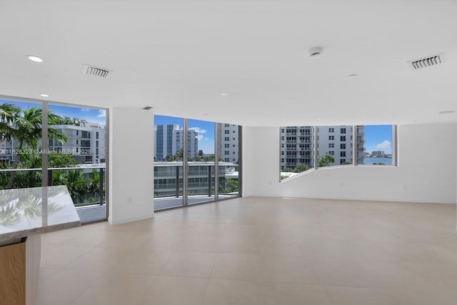 1135 103rd St Unit 408, Bay Harbor Islands, FL 33154 - unfurnished room featuring a view of city, a smoke detector, and recessed lighting