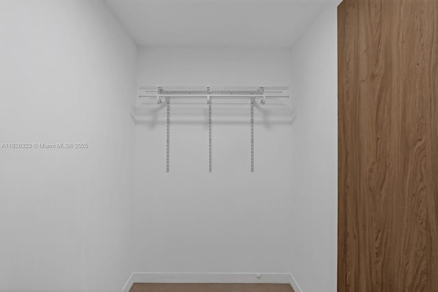 1135 103rd St Unit 408, Bay Harbor Islands, FL 33154 - view of walk in closet
