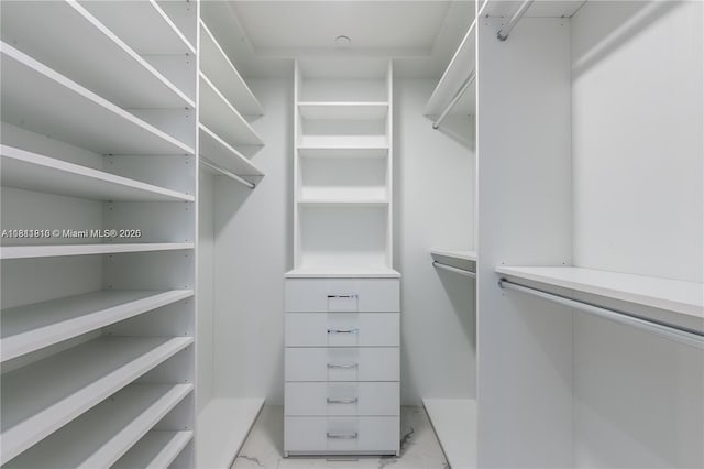 851 NE 1st Ave Unit 3308, Miami, FL 33132 - walk in closet featuring light marble finish floors
