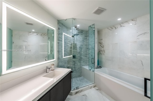 851 NE 1st Ave Unit 3308, Miami, FL 33132 - bathroom with a garden tub, vanity, a stall shower, marble look tiles, and recessed lighting
