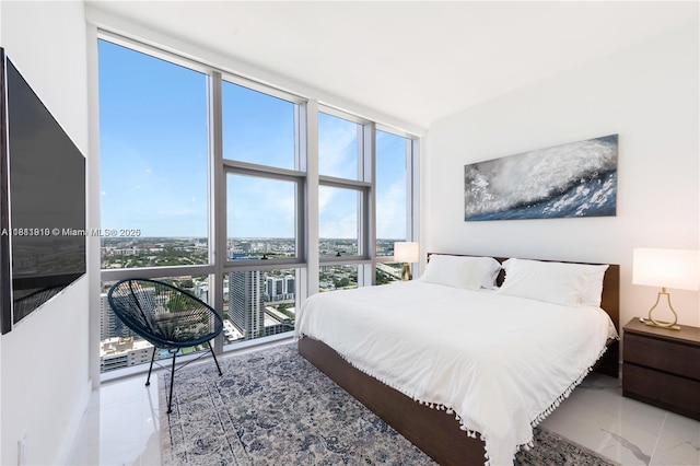 851 NE 1st Ave Unit 3308, Miami, FL 33132 - bedroom with expansive windows and marble finish floors