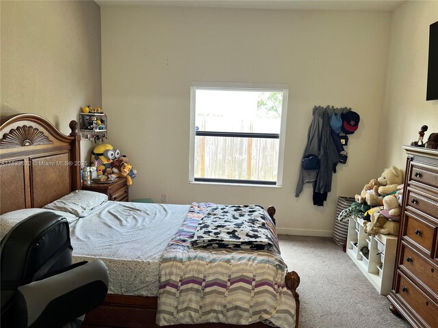 134 NE 23rd Ter, Homestead, FL 33033 - bedroom with carpet floors and baseboards