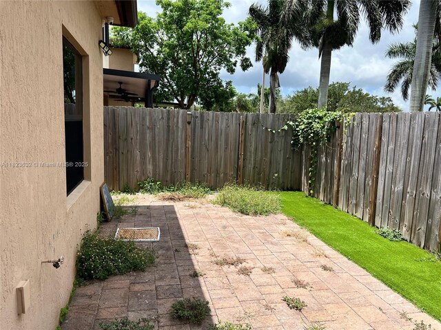 134 NE 23rd Ter, Homestead, FL 33033 - view of patio with ceiling fan