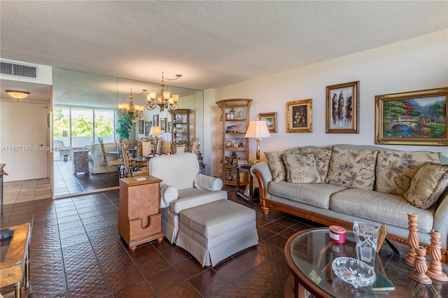 5 Island Ave Unit 6A, Miami Beach, FL 33139 - living area featuring a chandelier, a textured ceiling, and dark tile patterned flooring