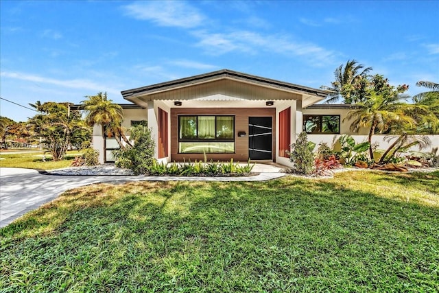 5890 SW 13th St, Plantation, FL 33317 - single story home with a front lawn and stucco siding