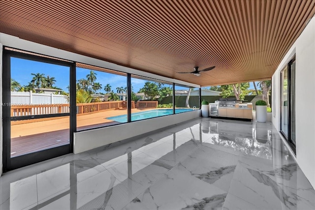 5890 SW 13th St, Plantation, FL 33317 - sunroom with exterior kitchen and ceiling fan