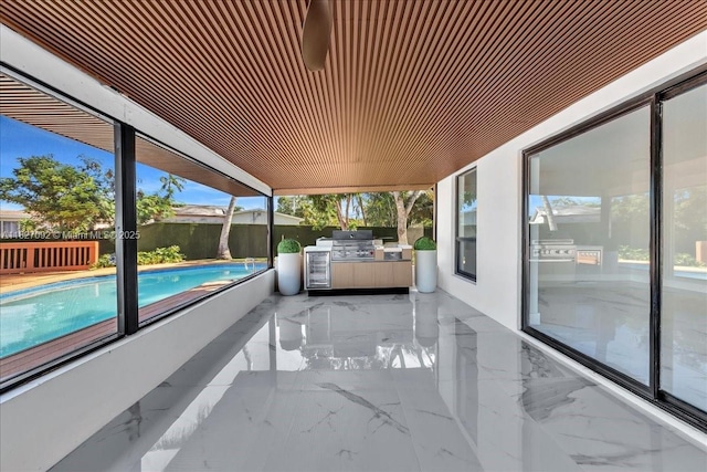 5890 SW 13th St, Plantation, FL 33317 - fenced backyard featuring an outdoor kitchen