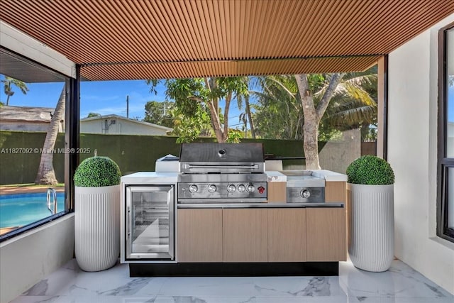 5890 SW 13th St, Plantation, FL 33317 - view of patio featuring exterior kitchen and wine cooler