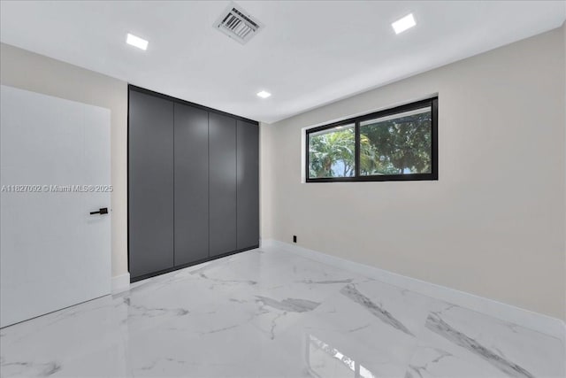 5890 SW 13th St, Plantation, FL 33317 - unfurnished bedroom with baseboards and light marble finish flooring