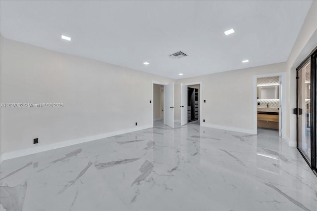 5890 SW 13th St, Plantation, FL 33317 - spare room featuring recessed lighting and light marble finish flooring