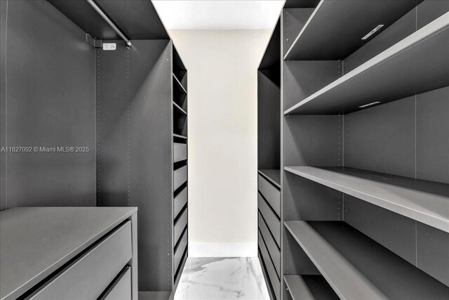 5890 SW 13th St, Plantation, FL 33317 - walk in closet with light marble finish flooring