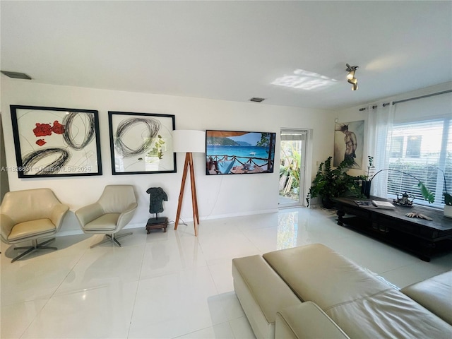 759 NE 87th St, Miami, FL 33138 - tiled living area featuring healthy amount of natural light