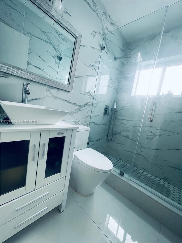 759 NE 87th St, Miami, FL 33138 - full bathroom featuring a marble finish shower, vanity, and tile walls