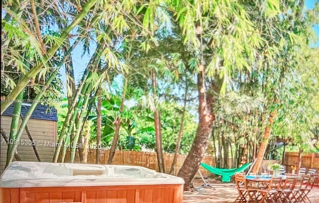 759 NE 87th St, Miami, FL 33138 - view of yard with a hot tub and a patio