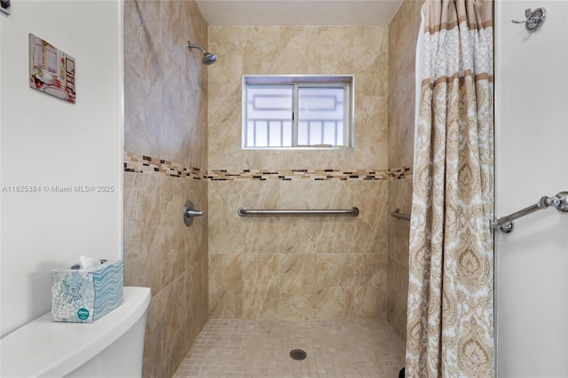 7101 W 24th Ave Unit 27, Hialeah, FL 33016 - bathroom featuring tiled shower and toilet