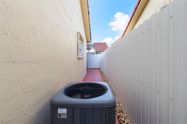 7101 W 24th Ave Unit 27, Hialeah, FL 33016 - exterior view of a cooling unit and stucco siding