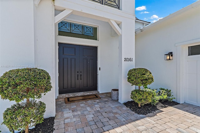 20161 SE Bridgewater Dr, Jupiter, FL 33458 - view of exterior entry with stucco siding