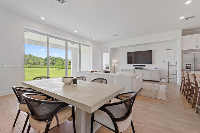 20161 SE Bridgewater Dr, Jupiter, FL 33458 - dining space with light wood-type flooring and recessed lighting