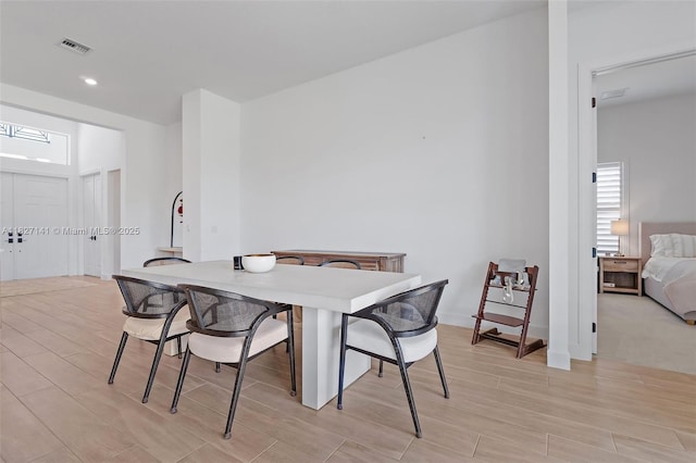 20161 SE Bridgewater Dr, Jupiter, FL 33458 - dining space with wood finish floors and recessed lighting