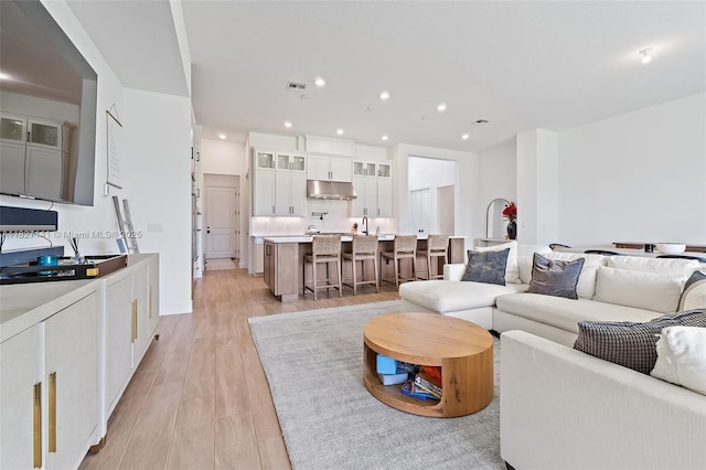 20161 SE Bridgewater Dr, Jupiter, FL 33458 - living area featuring light wood finished floors and recessed lighting
