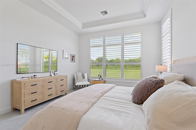 20161 SE Bridgewater Dr, Jupiter, FL 33458 - bedroom with multiple windows, a raised ceiling, light carpet, and ornamental molding