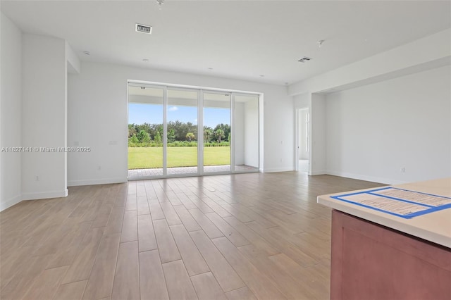 20161 SE Bridgewater Dr, Jupiter, FL 33458 - unfurnished room featuring light wood finished floors and baseboards