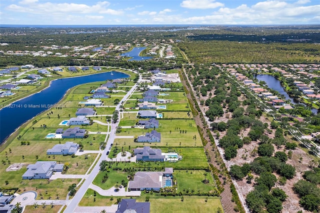 20161 SE Bridgewater Dr, Jupiter, FL 33458 - aerial view of property and surrounding area with a large body of water and nearby suburban area