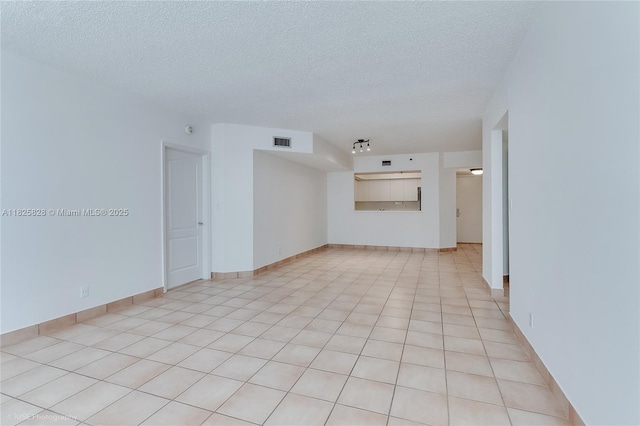 9455 Collins Ave Unit 301, Surfside, FL 33154 - empty room featuring a textured ceiling