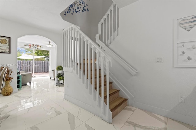 3818 SW 171st Ter, Miramar, FL 33027 - staircase featuring marble finish flooring and arched walkways