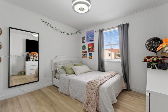 3818 SW 171st Ter, Miramar, FL 33027 - bedroom with light wood-type flooring