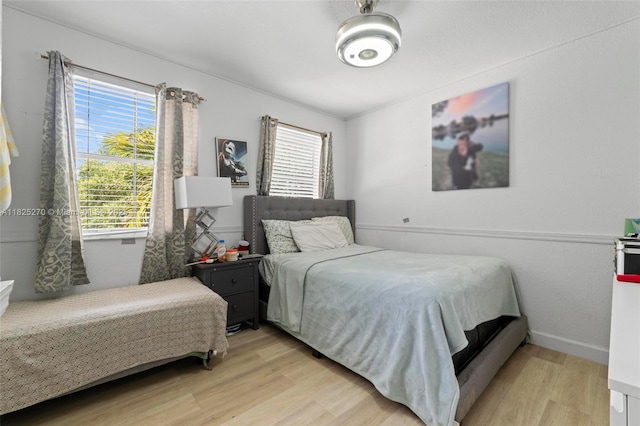 3818 SW 171st Ter, Miramar, FL 33027 - bedroom featuring light wood-type flooring and baseboards