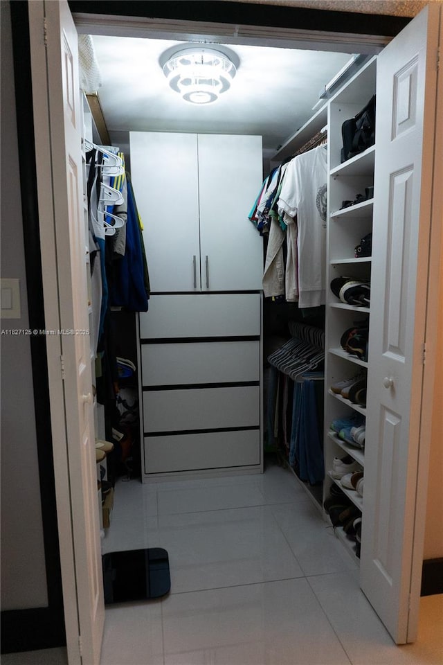 8215 SW 152nd Ave Unit G-307, Miami, FL 33193 - walk in closet featuring light tile patterned floors
