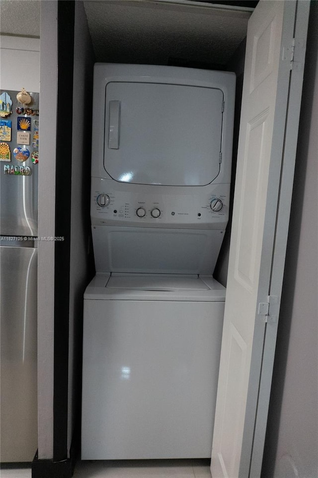 8215 SW 152nd Ave Unit G-307, Miami, FL 33193 - laundry area with stacked washer / dryer