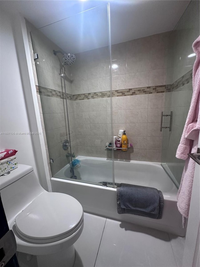 8215 SW 152nd Ave Unit G-307, Miami, FL 33193 - bathroom featuring shower / bath combination with glass door and toilet