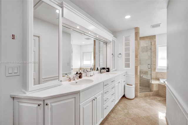 6731 SW 138th St, Palmetto Bay, FL 33158 - full bathroom featuring double vanity, a stall shower, recessed lighting, and a garden tub