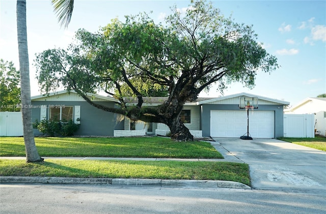 7985 NW 1st St, Margate, FL 33063 - ranch-style home with an attached garage and driveway