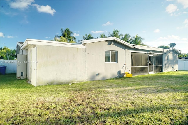 7985 NW 1st St, Margate, FL 33063 - back of property featuring stucco siding and a sunroom