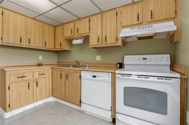 4168 Inverrary Dr Unit 402, Lauderhill, FL 33319 - kitchen with white appliances, under cabinet range hood, light countertops, a paneled ceiling, and light tile patterned floors