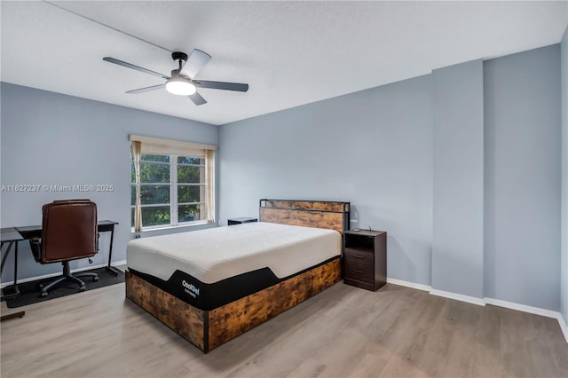 4168 Inverrary Dr Unit 402, Lauderhill, FL 33319 - bedroom with wood finished floors and ceiling fan