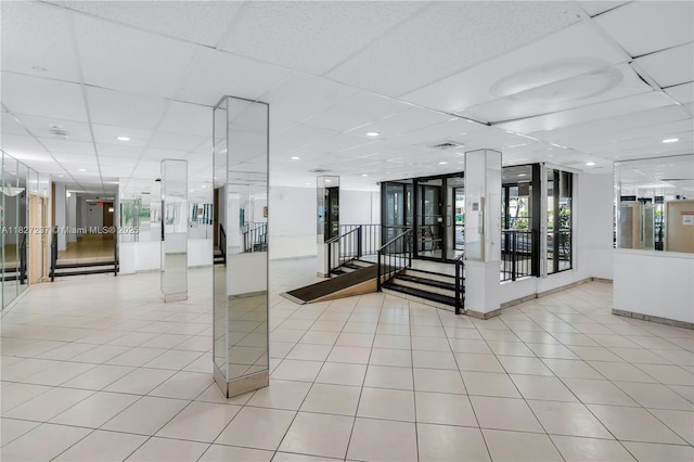 4168 Inverrary Dr Unit 402, Lauderhill, FL 33319 - building lobby with a drop ceiling and stairway