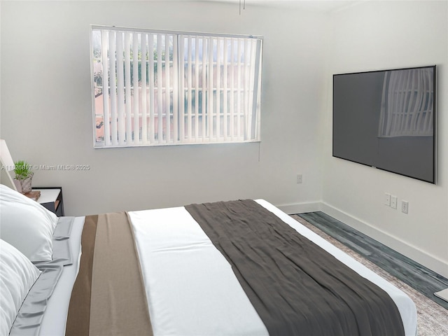 2009 SE 10th Ave Unit 318, Fort Lauderdale, FL 33316 - bedroom with wood finished floors and baseboards