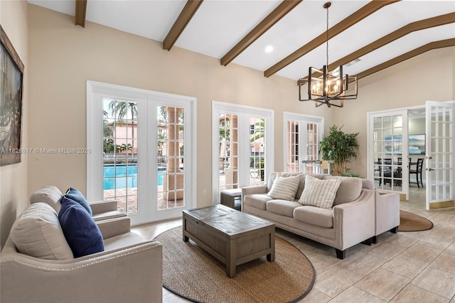 2009 SE 10th Ave Unit 318, Fort Lauderdale, FL 33316 - living area with french doors and a chandelier