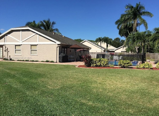 763 S Wind Cir, Sunrise, FL 33326 - rear view of house with stucco siding