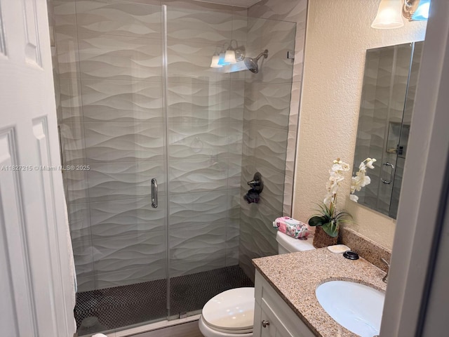 763 S Wind Cir, Sunrise, FL 33326 - bathroom featuring a textured wall, vanity, and a shower stall
