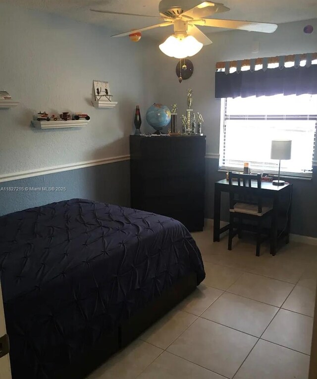 763 S Wind Cir, Sunrise, FL 33326 - bedroom with light tile patterned floors